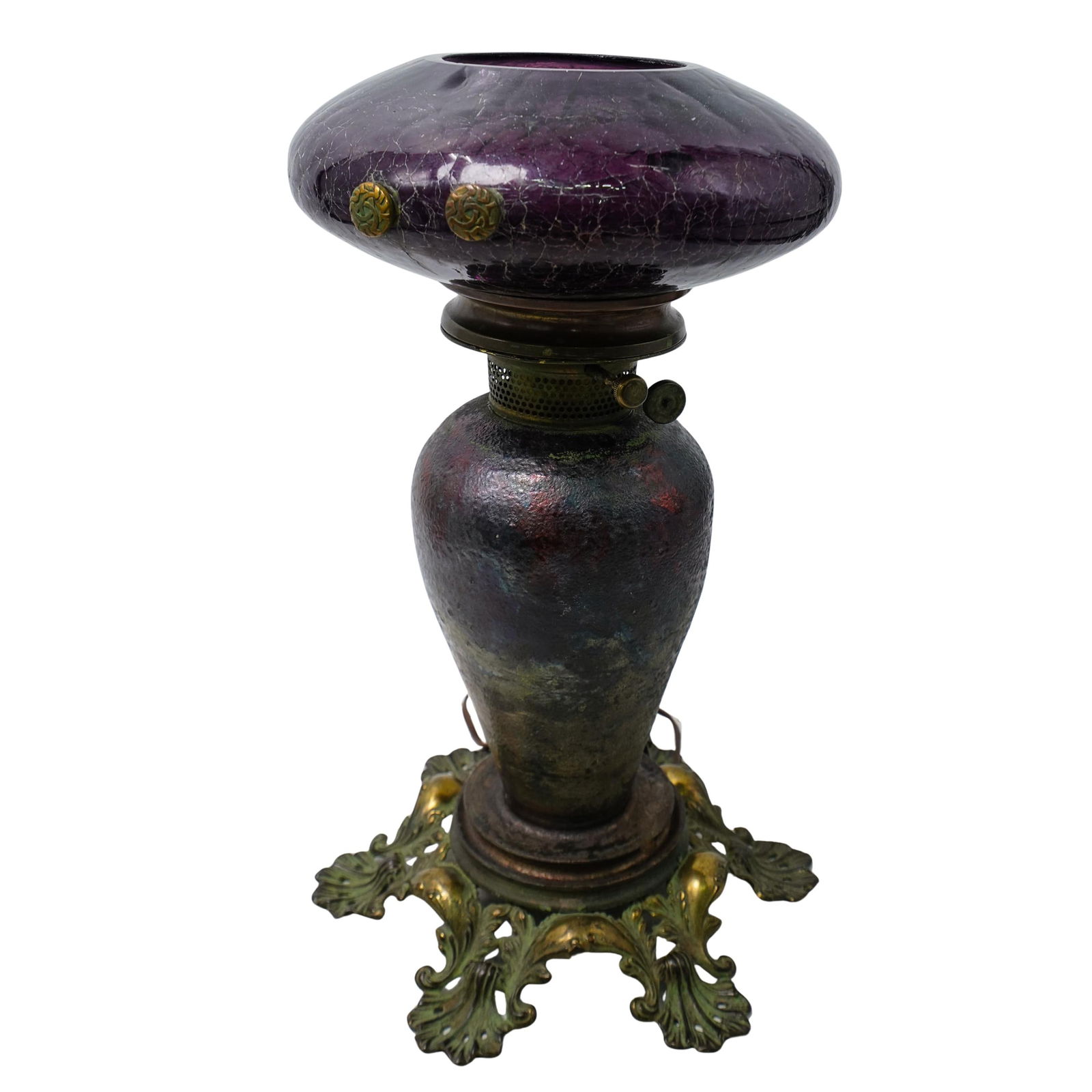 Antique Amethyst Glass and Bronze Lamp: Antique Amethyst Glass and Bronze LampEarly 20th Cent, EuropeanAntique amethyst glass and bronze converted lamp Footed on bronze carved filigree base. Bronze body with amethyst glass at top. Electrifi