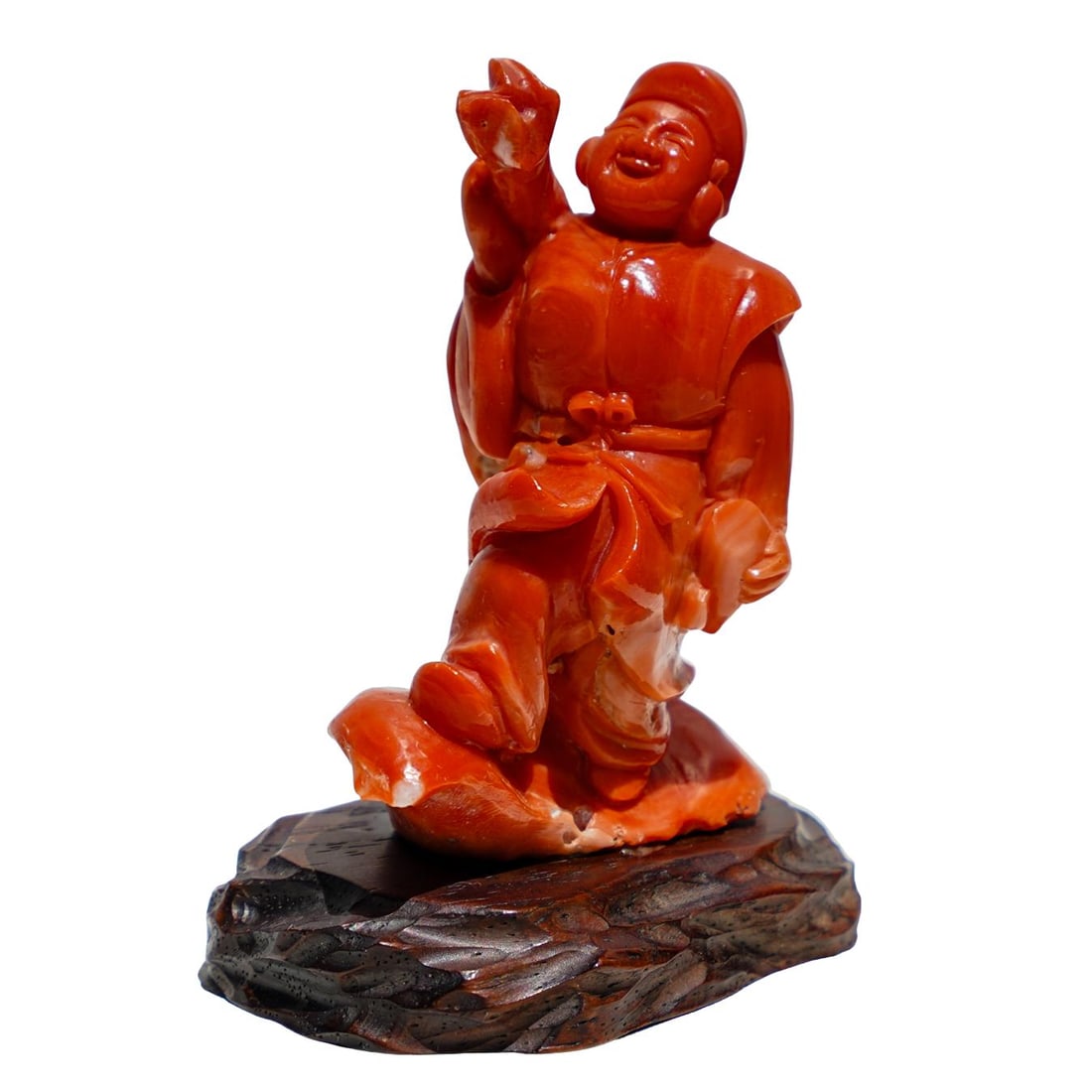 Japanese Carved Coral Figurine: Japanese Carved Coral Figurine20th Century, JapanJapanese carved coral figurine, depicting a male figure standing in a lively pose, holding what appears to be a sack over his shoulder. Standing atop a