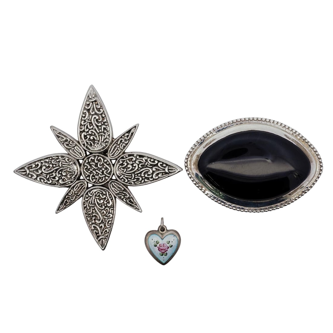 (3 Pc) Sterling Silver Onyx and Enamel Pendants: (3 Pc) Sterling Silver Onyx and Enamel Pendants21st Century, ContinentalGroup of (3) sterling silver pendants, featuring (1) John Hardy engraved tie clip signed on reverse, (1) oval shaped sterling br