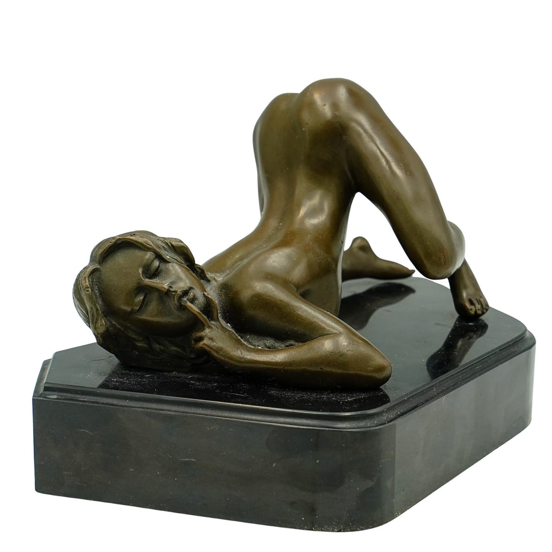 Nino Oliviono Erotic Bronze Sculpture: Nino Oliviono European, 20th century Nino Oliviono Erotic Bronze Sculpture Bronze, patinated Erotic sculpture of a woman with her back arched in a suggestive pose. Patinated bronze on a black stone ba