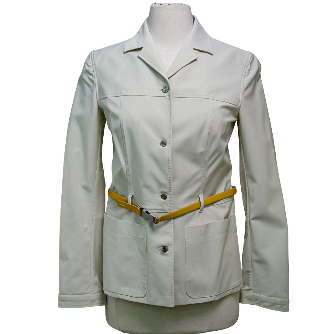 Prada Pants and Blazer Set: Prada Pants and Blazer Set20th century, ItalyBeige Prada pants and blazer set. Blazer has silver "Prada" button closures down the front and on sleeves and yellow belt that has a "Prada" buckle closure