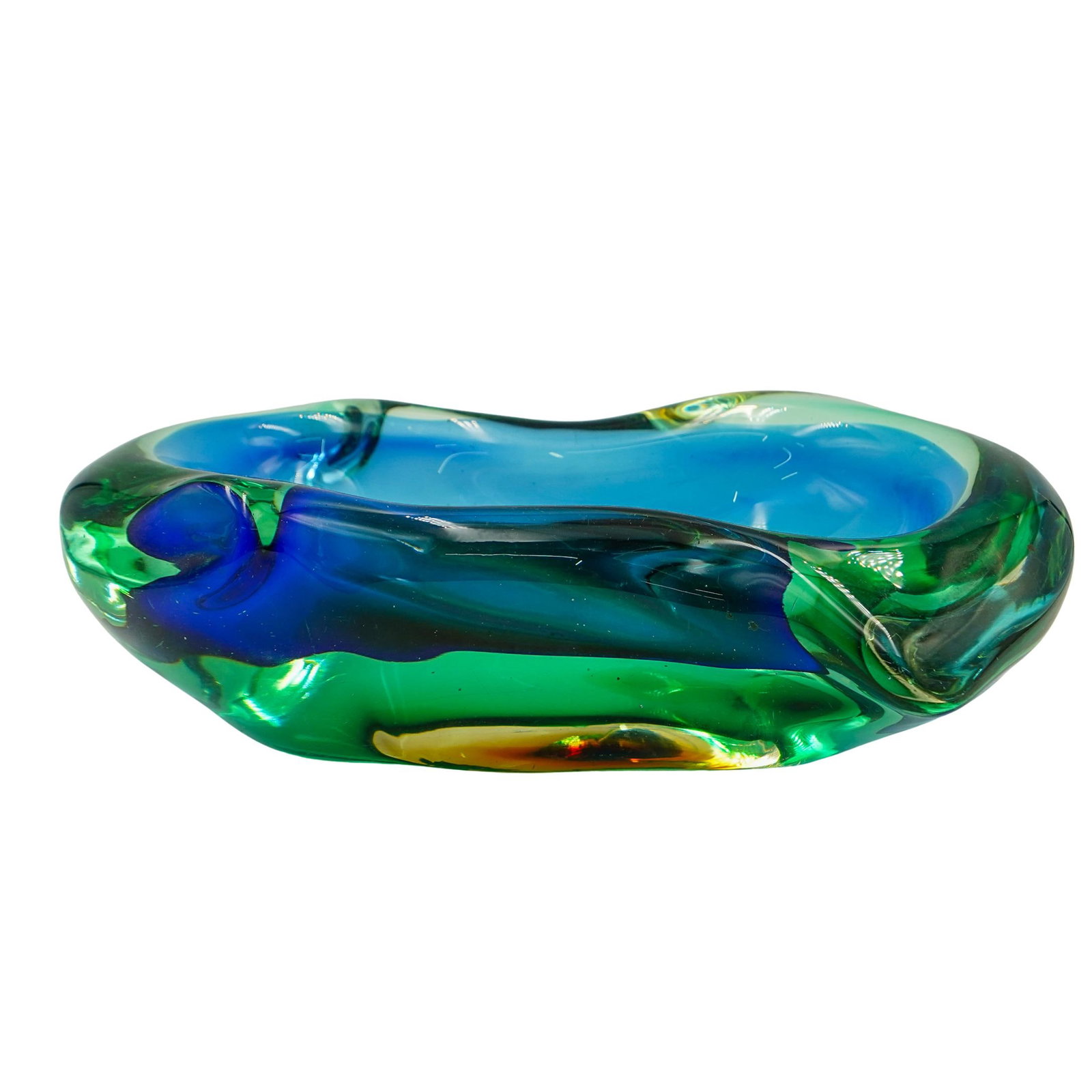 Heavy Murano Glass Sommerso Center Bowl: Heavy Murano Glass Sommerso Center Bowl Late 20th Cent, Italy Heavy Murano glass sommerso center bowl, displaying blue green and honey amber hues in a anamorphic design. H: 3.5" L: 10.5" W: 7"
