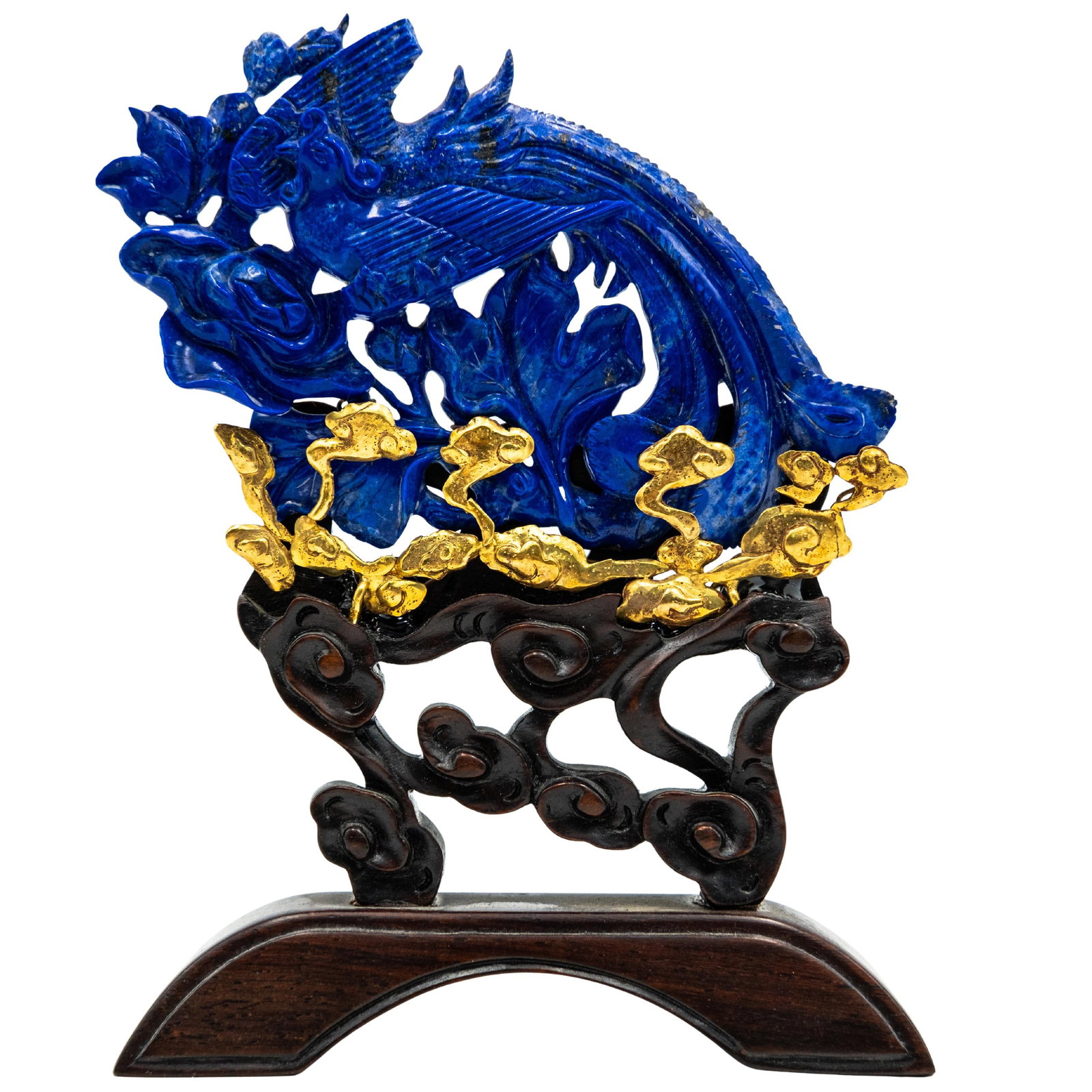 Chinese Carved Lapis and 14k Gold Phoenix on Wooden Base: Chinese Carved Lapis and 14k Gold Phoenix on Wooden Base 20th century, China Chinese carved lapis lazuli phoenix accented by 14k gold on a wooden base with floral gilt accents. (57) H 4 3/8" W 1" L 3 