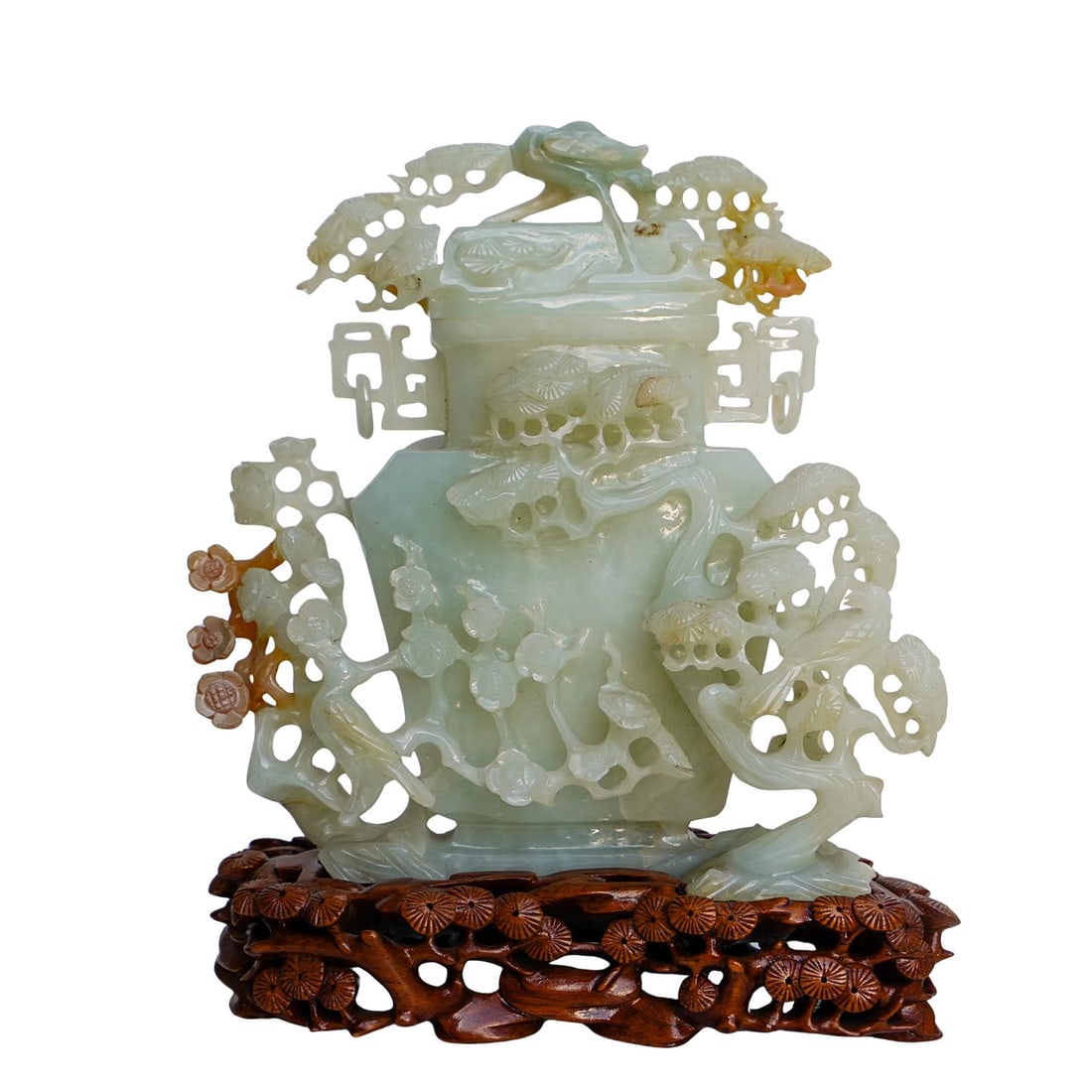 Chinese Carved Jade Lidded Sculpture Bottle on Wooden Base: Chinese Carved Jade Lidded Sculpture Bottle on Wooden Base20th century, ChinaChinese carved jade lidded sculpture bottle on a wooden base. Jade is carved with decorative floral elements and lidded. Ba