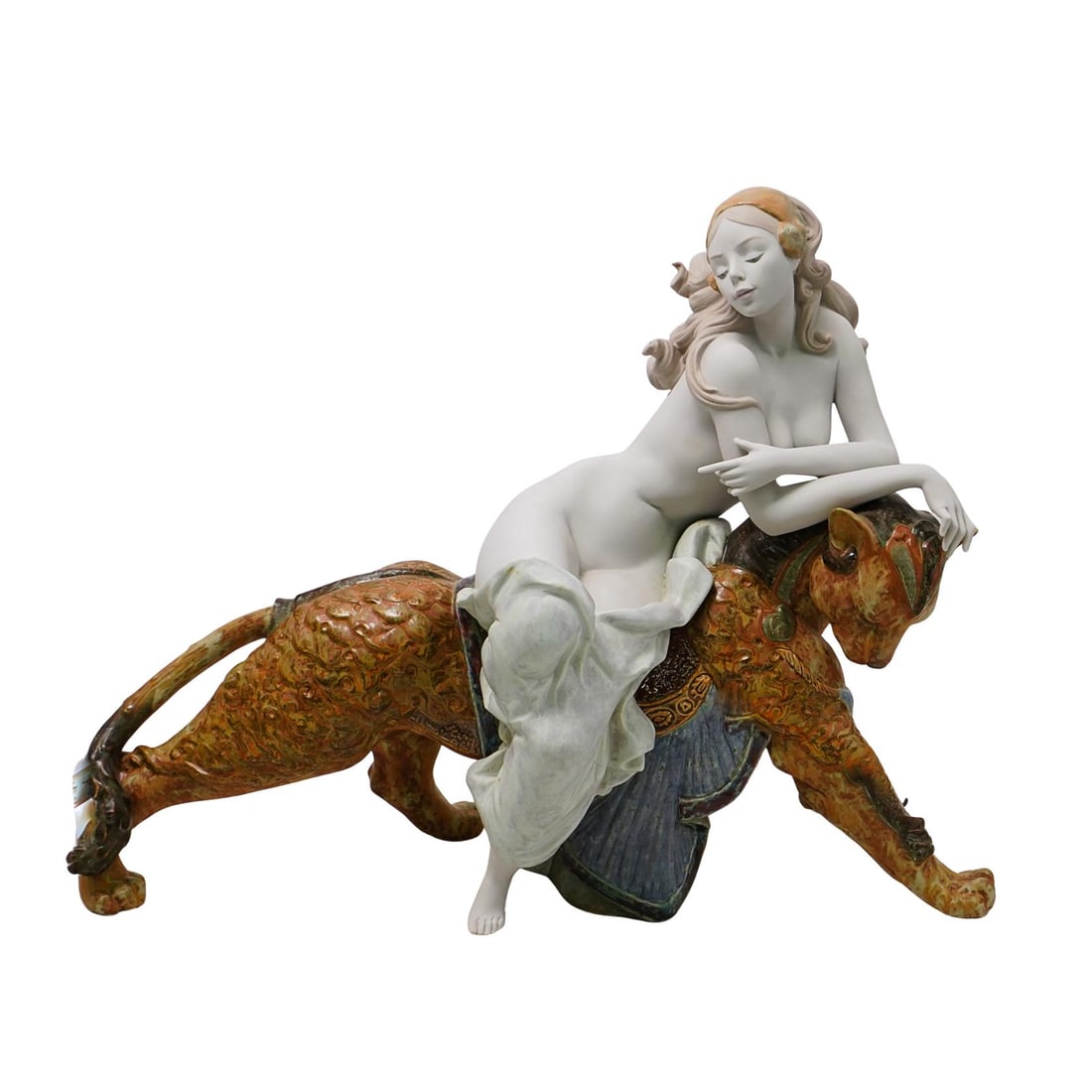 Lladro Bacchante with Feline Porcelain Sculpture: Lladro Bacchante with Feline Porcelain Sculpture 2003, Spain Lladro "Bacchante" female nude figure riding on the back of a large feline. "Bacchante", in a mythological sense, refers to the female foll