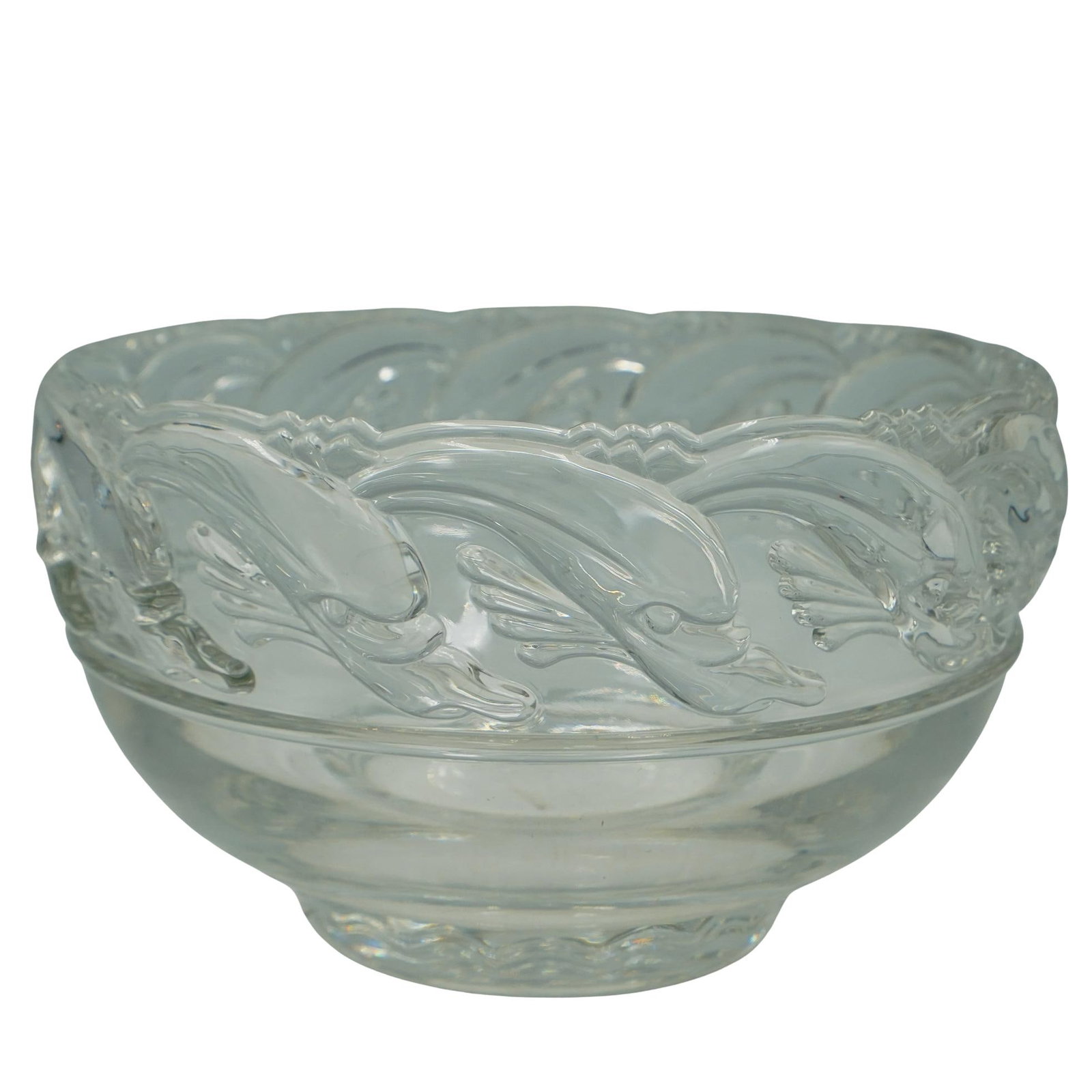 Tiffany "Dolphin" Crystal Glass Bowl: Tiffany "Dolphin" Crystal Glass Bowl 20th century, USA Tiffany glass bowl in the discontinued "Dolphin" pattern. Carved dolphin motifs border around the rim. Marked on bottom "Tiffany & Co." H 5" Diam