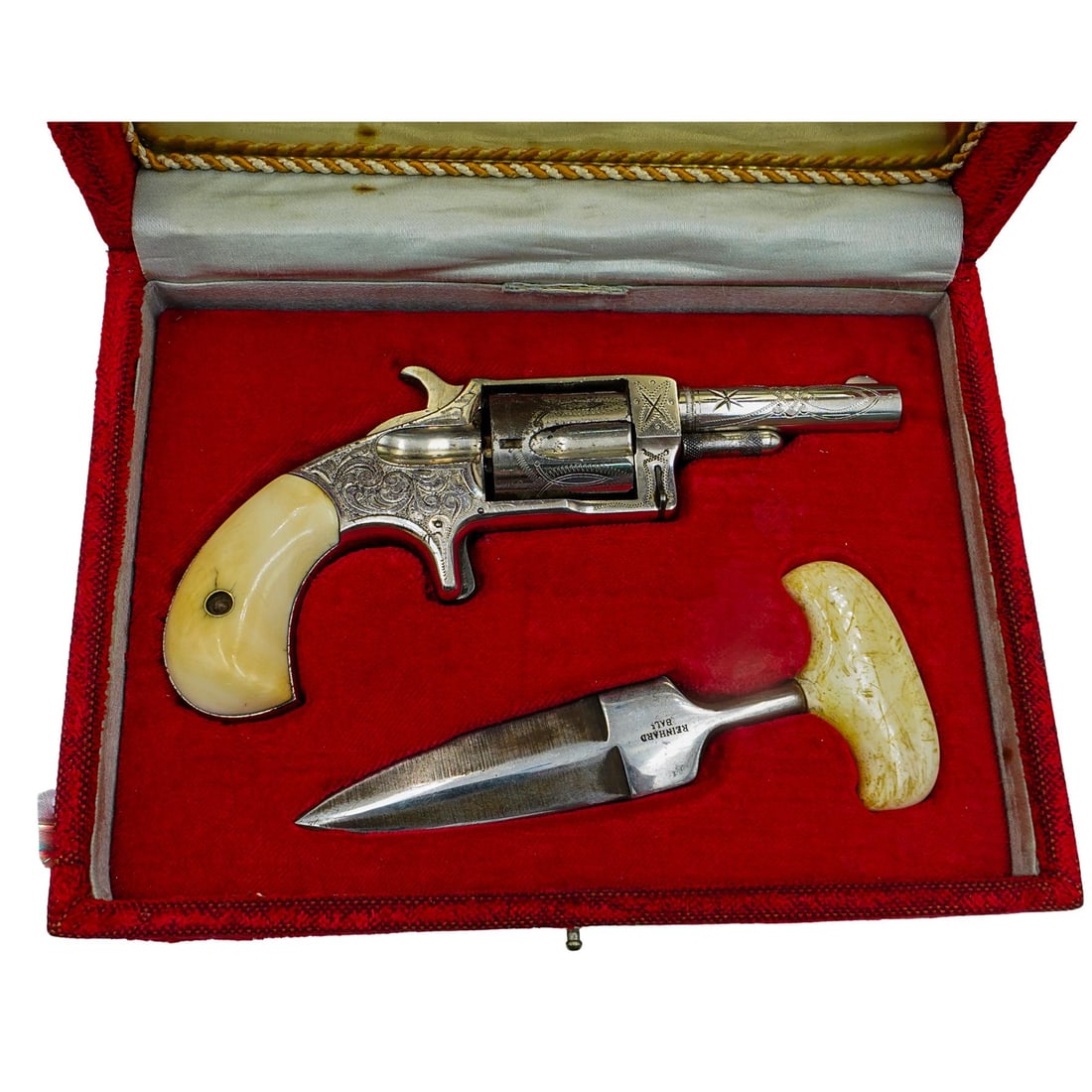 Antique Bone Inlay Gambler Set in Box: Antique Bone Inlay Gambler Set in BoxLate 19th to early 20th century, USAThis vintage gambler’s set is housed in a red velvet-lined display case with a mirrored lid. It features a miniature revolver