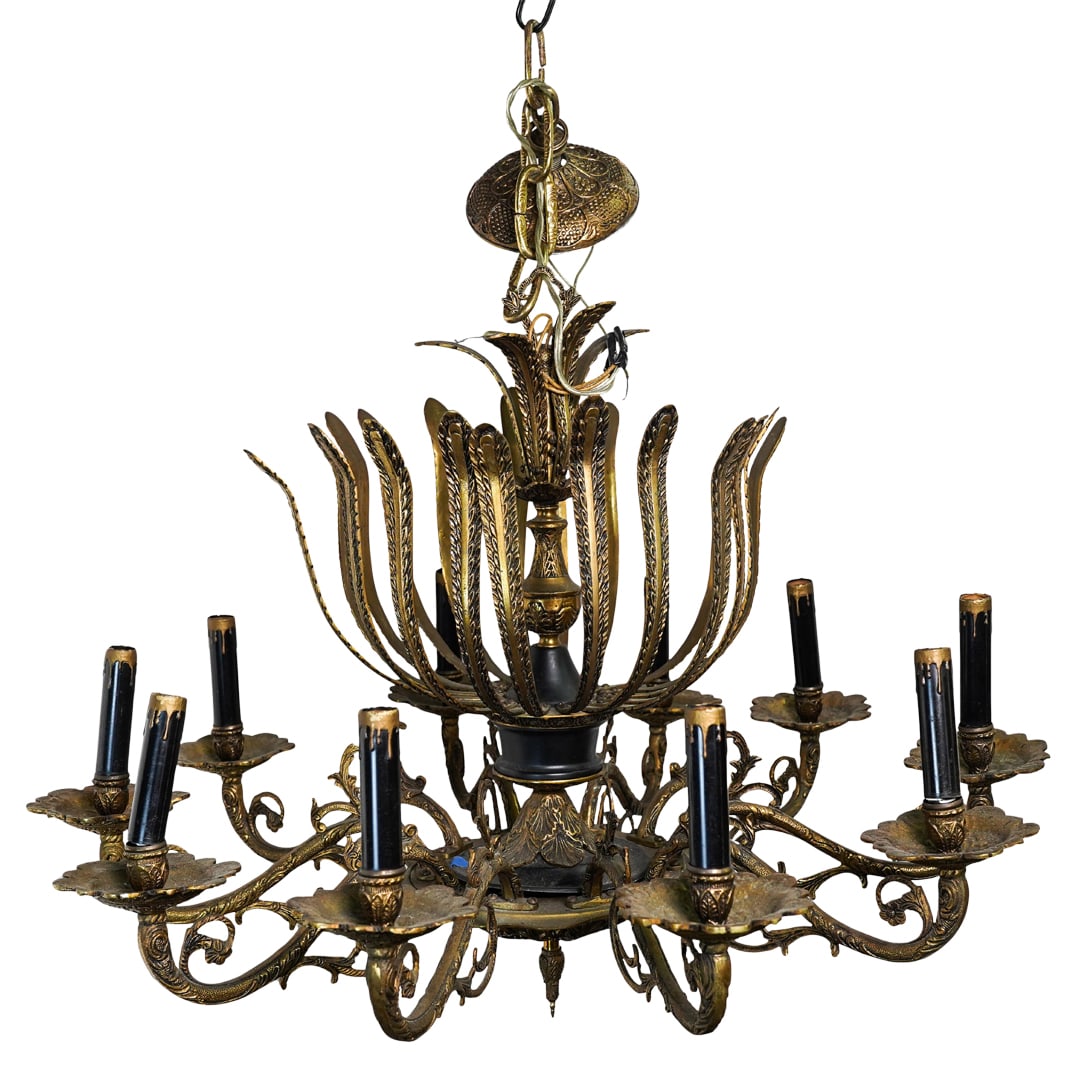 Spanish Gilt Bronze Chandelier: Spanish Gilt Bronze ChandelierEarly to mid 20th century, SpainGilt bronze chandelier. Ten light sockets with carved petal bases and decoratively carved arms. Center features a section of repeating car