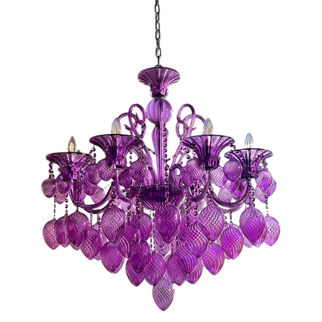Bello Vetro Murano Amthyst Glass Chandelier: Murano Amthyst Glass Chandelier21st Cent, ItalyMurano glass chandelier features hand-blown glass in a striking translucent purple hue. With six gracefully curved arms adorned with detailed glass bobec