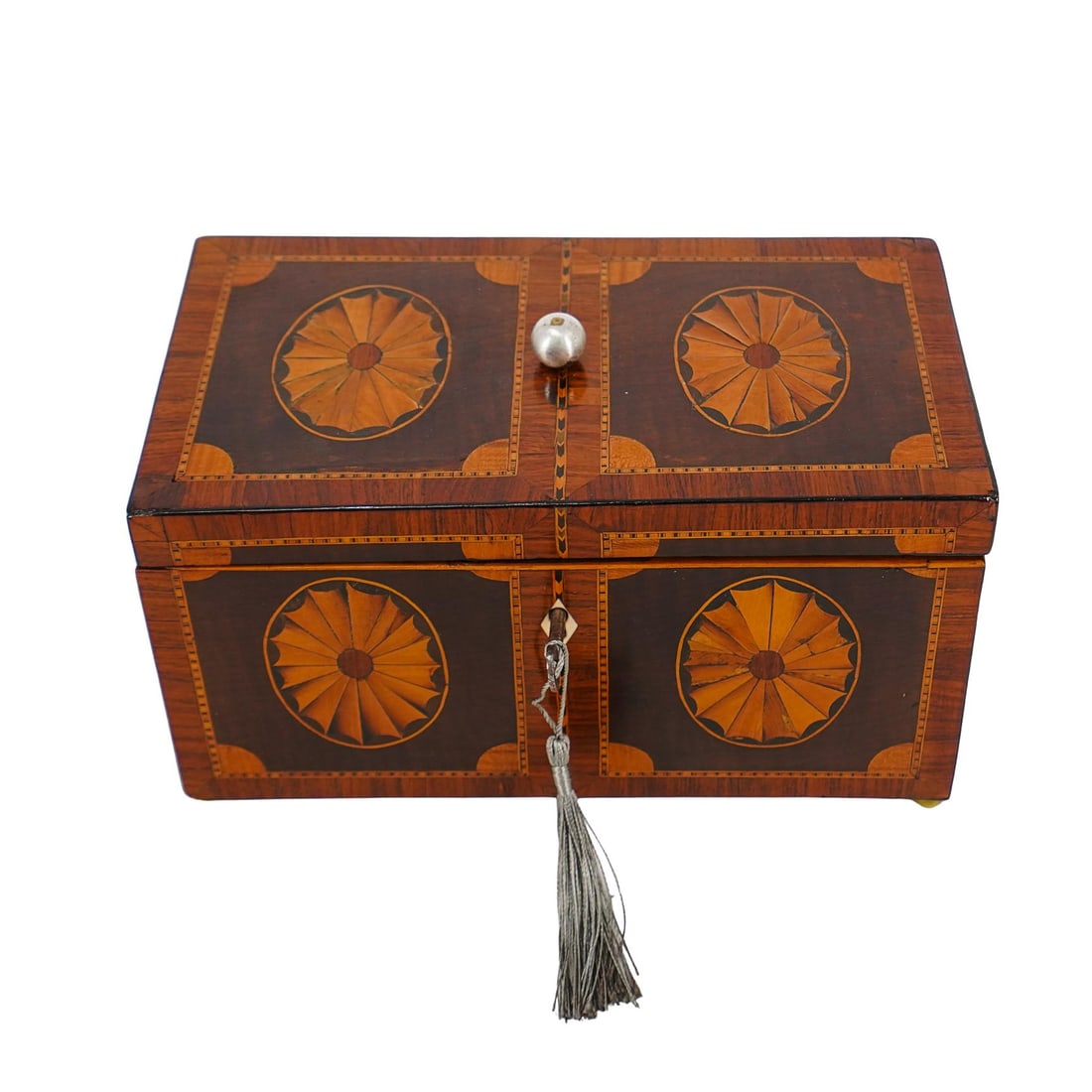 Antique English Marquetry Tea Caddy: Antique English Marquetry Tea Caddy Late 18th to Early 19th Century, England Antique English marquetry tea caddy, featuring intricate inlaid marquetry panels, round silver finial, rounded gilt feet, a