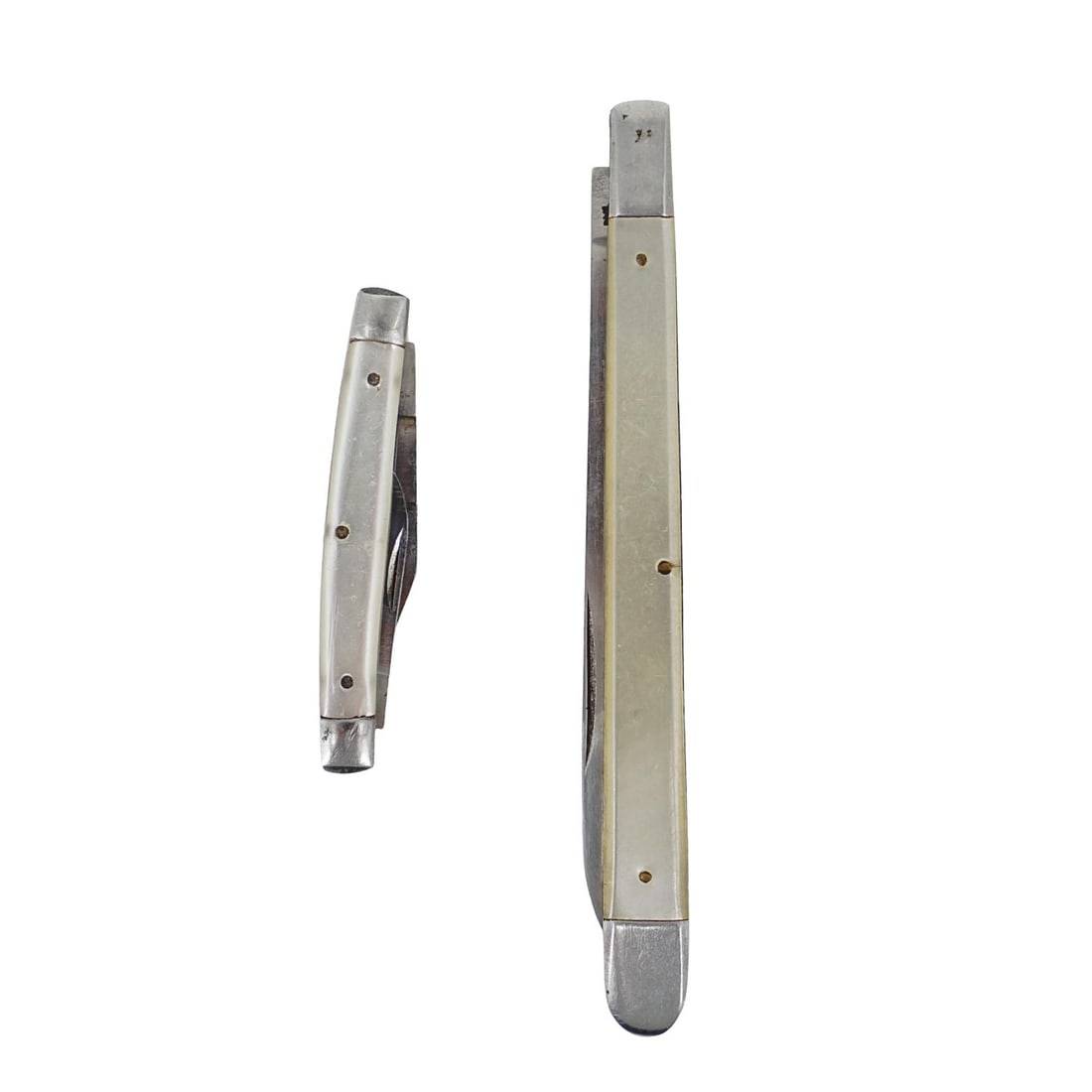 Pair Of Sabre Pearlescent Knives: Pair Of Sabre Pearlescent KnivesMid 20th Century, JapanPair of Sabre knives, (1) fruit knife with a pearlescent handle and stainless blade and (1) small pocket knife with pearlescent handle and stainl