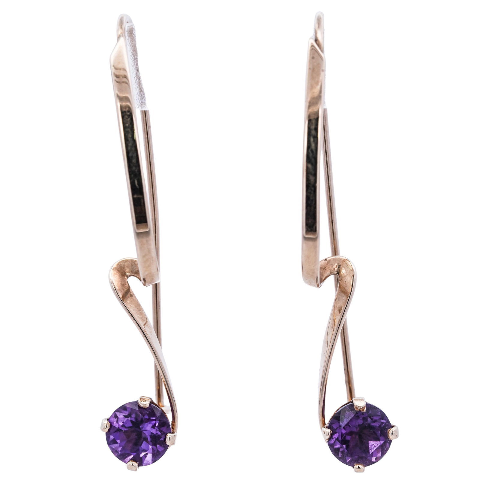 14k Gold and Amethyst Earrings: 14k Gold and Amethyst Earrings 21st Century, Continental 14k gold earrings featuring a sculptural design, forming into a gently arched, swooping silhouette. At the base of each curve is a round cut am