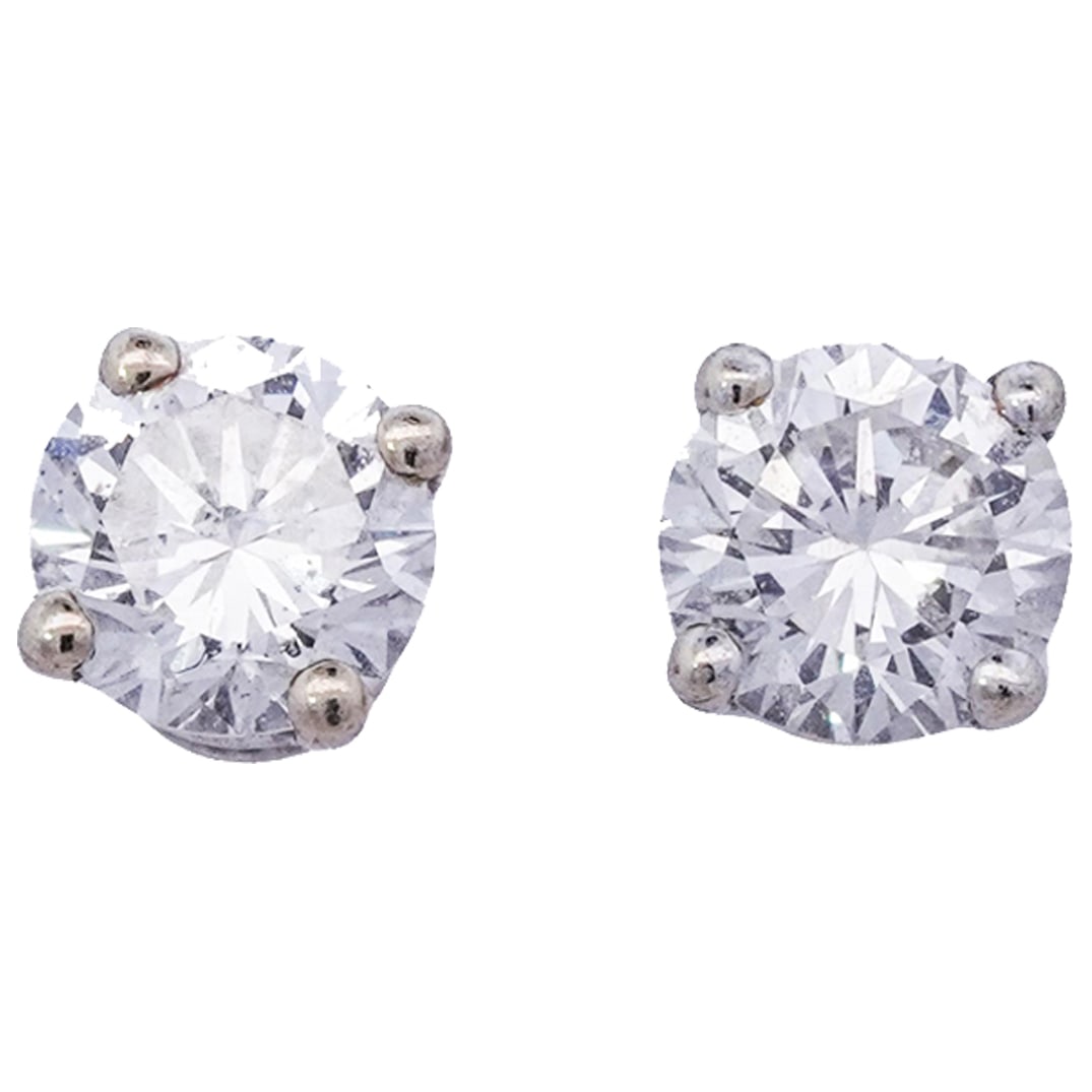 14k White Gold and Diamond Stud Earrings: 14k White Gold and Diamond Stud Earrings 21st Century, Continental Pair of 14k white gold stud earrings, each featuring a round cut diamond (approx. 0.4 carats total) held securely in place by a prong