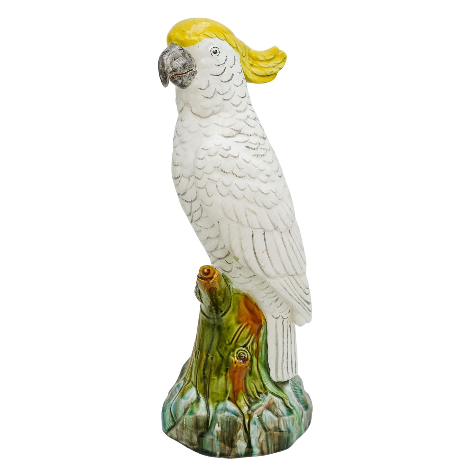Minton Majolica Sulphur Crested Cockatoo Figurine: Minton Majolica Sulphur Crested Cockatoo FigurineLate 19th Century, EnglandMinton majolica figurine, depicting a sulphur crested cockatoo perched on a naturalistic base. Stamped underside "MINTON ENGL