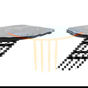 MCM Orthoceras Fossil Coffee Table: MCM Orthoceras Fossil Coffee TableMid 20th century, ContinentalMid century modern orthoceras fossil coffee table. Wooden frame and legs with large slab of black stone with naturally inlaid orthoceras