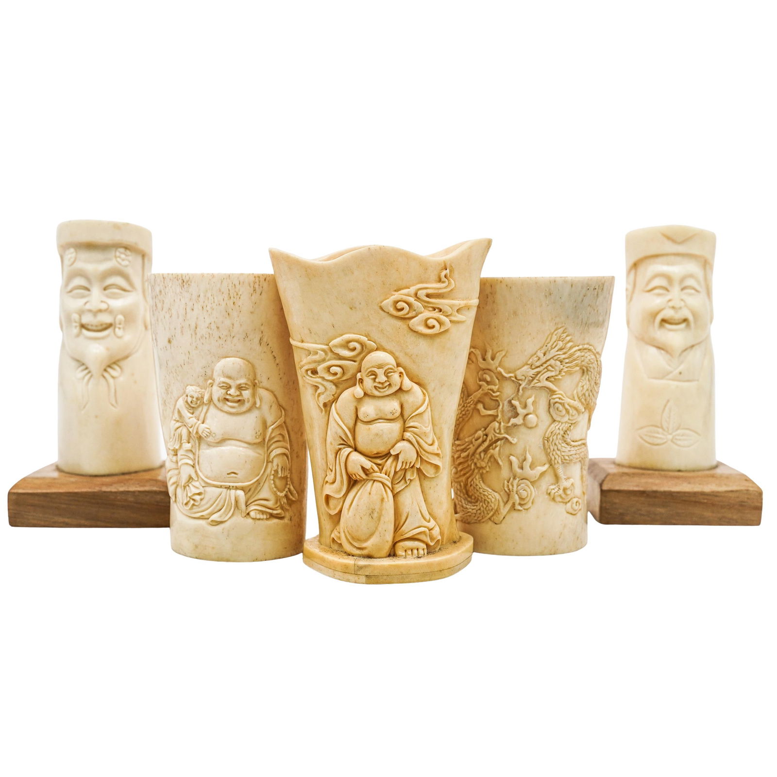 (5 Pc) Antique Chinese Carved Bone Cups: (5 Pc) Antique Chinese Carved Bone CupsEarly 20th c., ChinaHighly detailed hand carved bone cups. Two have Buddhas and one has traditional dragons. There are two mounted on 2.5"L x 2.5"W x 0.75"H base