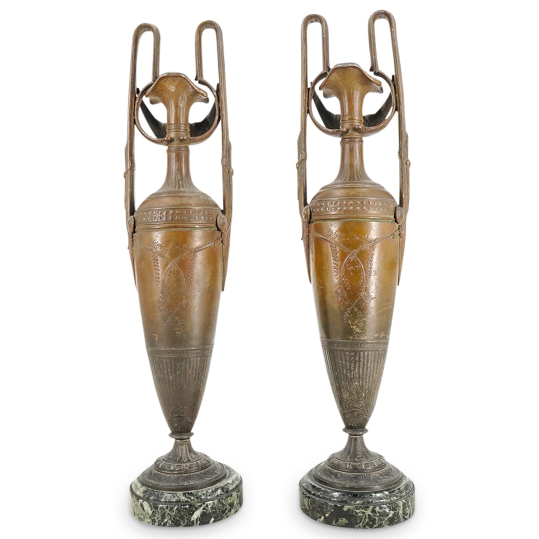 Pair of French Art Nouveau Sculptural Spelter Vases: Pair of French Art Nouveau Sculptural Spelter VasesEarly 20th Century, FrancePair of French Art Nouveau patinated spelter vases atop round black and green marble bases, featuring three attached sculpt