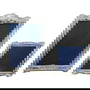(2 Pcs) English Sterling Silver Picture Frames: (2 Pcs) English Sterling Silver Picture Frames20th century, EnglandTwo picture frames are made of sterling silver, wood, and blue velvet. Both feature silver scrollwork patterns and an easel back. Eac