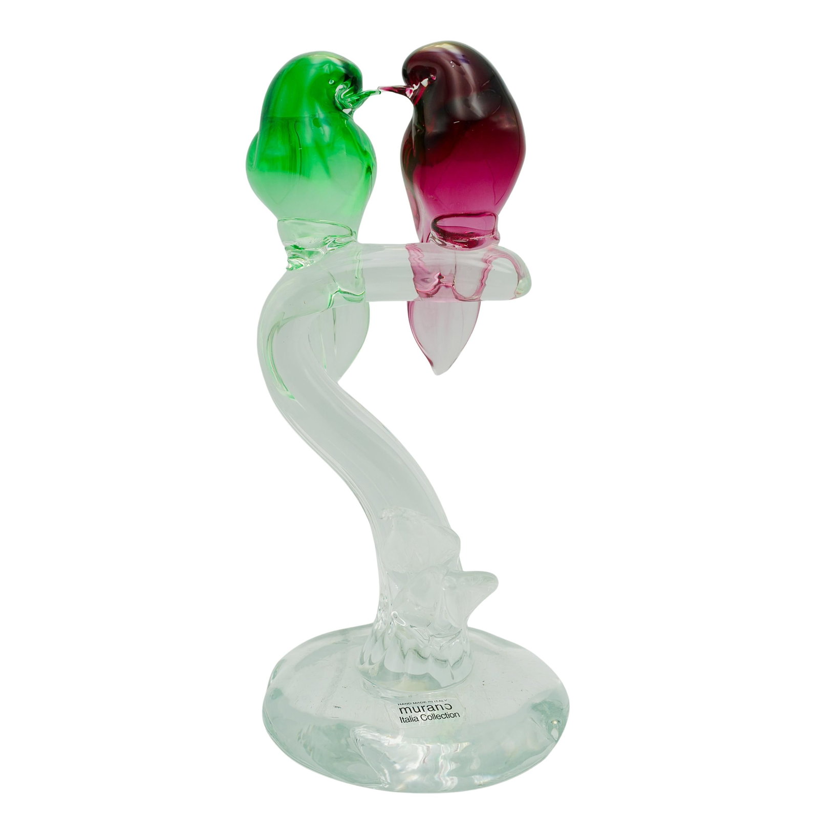 Murano Glass Birds Statue: Murano Glass Birds Statue Late 20th c., Italy Blown glass statue featuring a green and pink birds perched on a clear branch. Murano sticker on the base. 5.5"dia. x 11.5"H