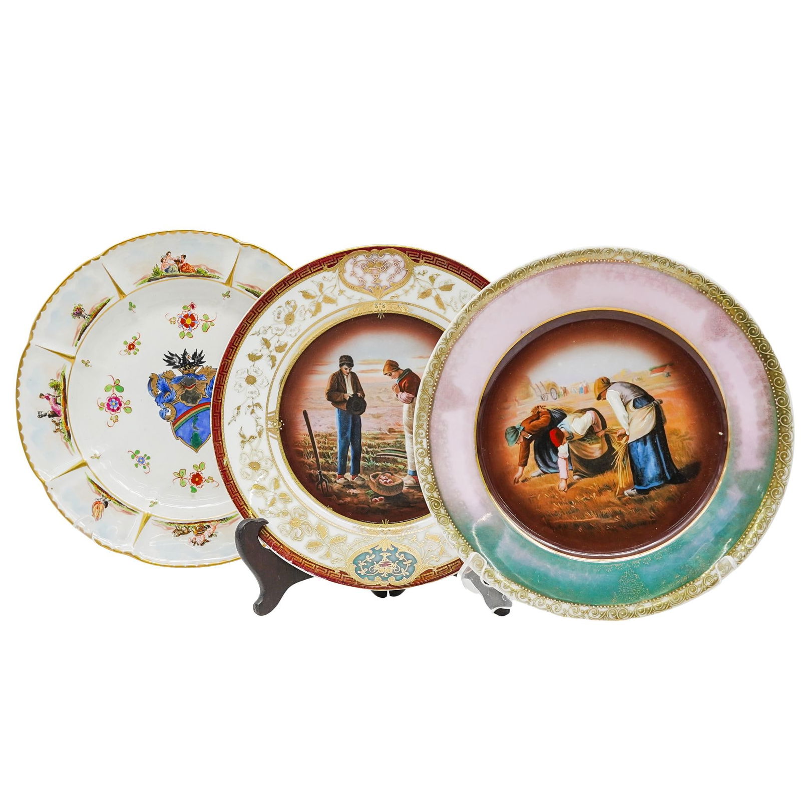 (3 Pcs) Vintage Porcelain Plate Collection: (3 Pcs) Vintage Porcelain Plate Collection20th century, ContinentalThe collection includes Royal Vienna style and Capodimonte style pieces:1. Hand-painted porcelain plate featuring a rural harvest sce