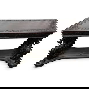 Att. RJ Horner Griffin Carved Wooden Table: Att. RJ Horner Griffin Carved Wooden TableLate 19th to Early 20th Century, AmericaCarved dark wooden table with unique griffin legs and decoratively carved sides. One drawer. Attributed to designs by