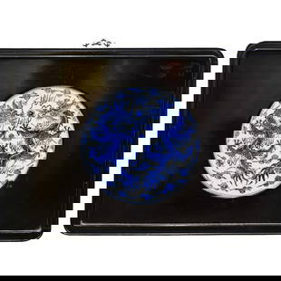 Chinese Blue & White Porcelain Dragon Wall Plaque: Chinese Blue & White Porcelain Dragon Wall Plaque20th c., ChinaTraditional ornate Chinese porcelain piece depicting two dragons housed in dark wood.16"L x 22.25"W