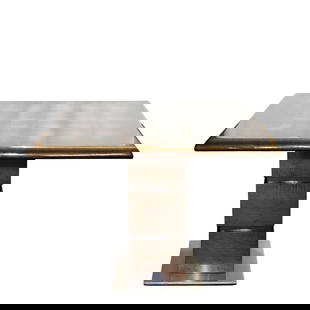 Contemporary Square Pedestal Table: Hurtado Contemporary Square Chrome Pedestal TableLate 20th Century, USAContemporary square pedestal table, featuring a square tabletop with rounded, beveled edges. The pedestal base is tiered, compose