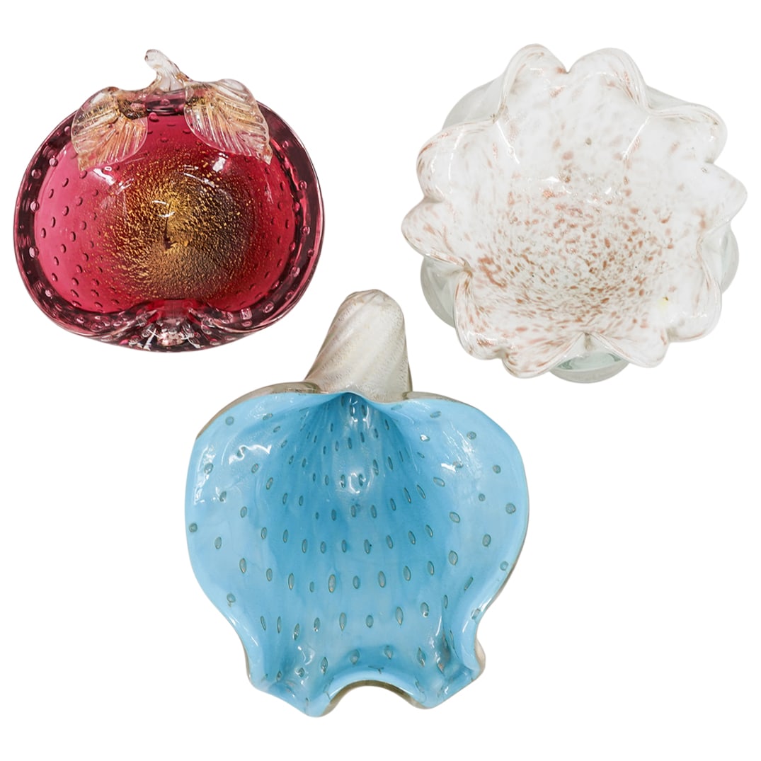 (3 Pc) Murano Glass Trinket Bowls: (3 Pc) Murano Glass Trinket Bowls 20th c., Italy Cranberry glass bowl with bubbles and gold flecks. White floral glass bowl with gold flecks. White and blue ridged glass shell with bubbles and gold fl