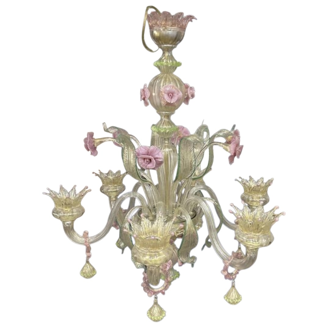 Italian Venetian Glass Chandelier: Italian Venetian Glass Chandelier20th century, ItalyVintage Italian Venetian glass chandelier with hand-blown craftsmanship and floral design. Made of clear and pale yellow glass, accented with delica