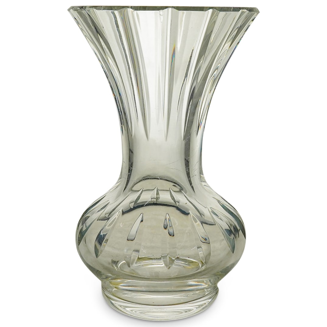 Baccarat Clear Crystal Vase: Baccarat Clear Crystal Vase20th Cent., FranceA Baccarat clear crystal vase with tapered, flared, and faceted form. Baccarat acid stamp to underside.H: 10 1/4" W: 7"