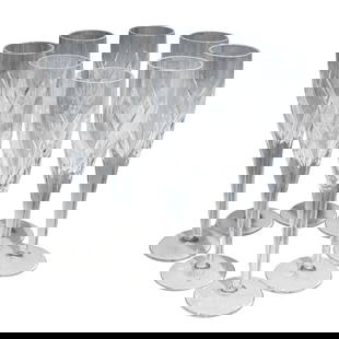 (8 Pc) John Rocha By Waterford Crystal Champagne Flutes Set: (8 Pc) John Rocha By Waterford Crystal Champagne Flutes Set20th Century, Ireland(8 Pc) John Rocha by Waterford crystal champagne flutes set, with cut design. Marked with 'John Rocha Waterford' acid et