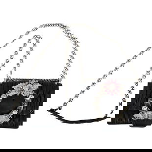 Vintage Miu Miu Nappa Matelasse Leather Jewel Crossbody Bag: Vintage Miu Miu Nappa Matelasse Leather Jewel Crossbody Bag20th Century, ItalyVintage Miu Miu Nappa Matelasse black hued leather crossbody bag, embellished with jeweled buckle. With metal chain, leath
