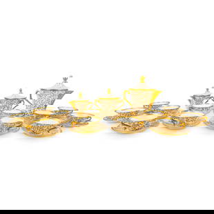 (27 Pc) Antique Sevres Porcelain Tea Set: (27 Pc) Antique Sevres Porcelain Tea Set19th Century, possibly older; France(27 Pc) Antique Sevres Porcelain Tea Set. In white glazed porcelain with leaf painted gilt motifs. Includes a total of twent