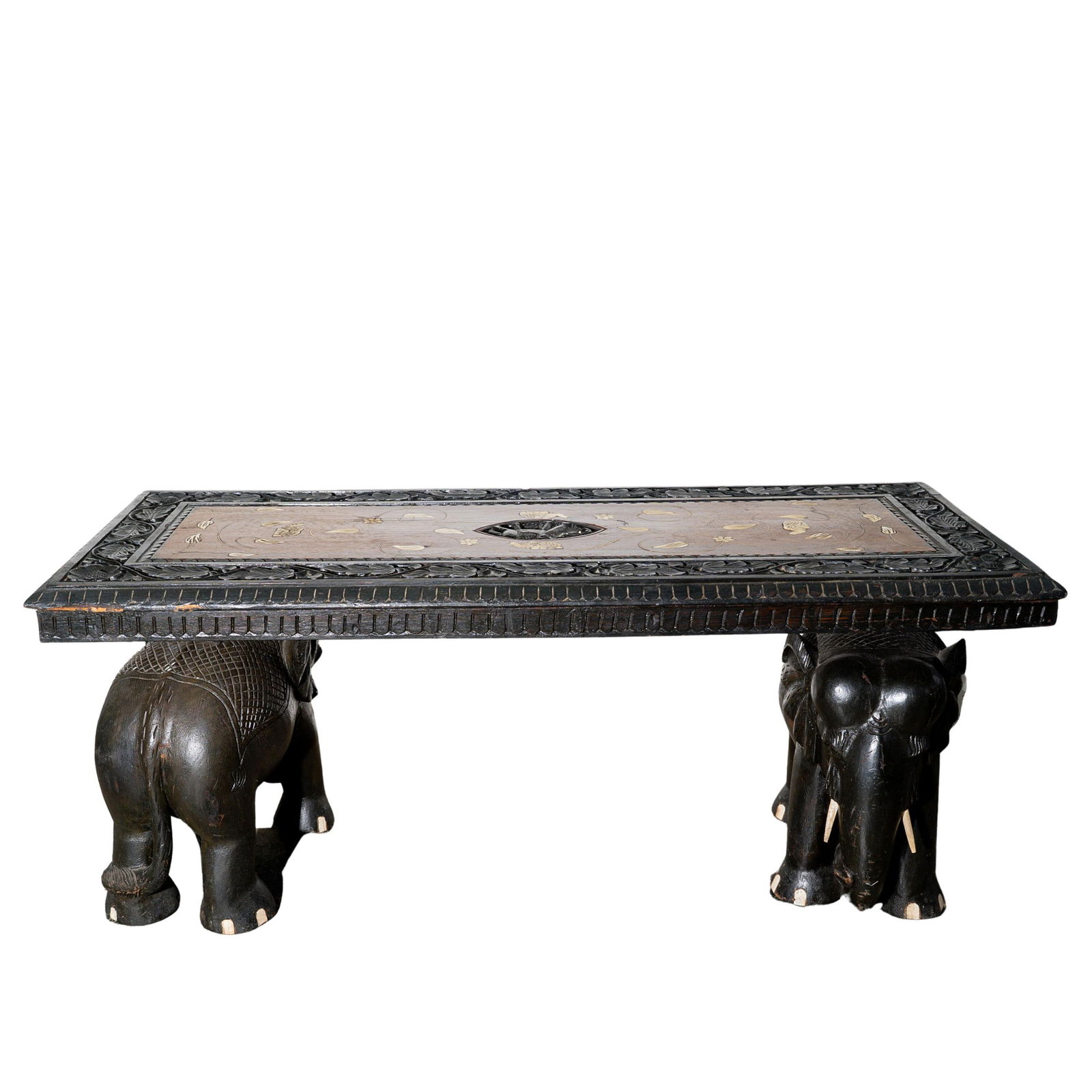 Anglo-Indian Elephant Marquetry Table: Anglo-Indian Elephant Marquetry TableLate 19th-early 20th century, IndianAn Anglo-Indian wooden table. Black carved wooden elephant legs with carved bone tusks. Black and dark brown table top with flo
