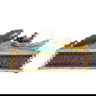 Antique Cast Iron 'Jonah and the Whale' Coin Bank: Antique Cast Iron 'Jonah and the Whale' Coin Bank20th Cent.Antique cast iron 'Jonah and the Whale' cast iron coin bank with polychrome finsihs. Marked: 'Taiwan'H: 5.5" x W: 3.5" x L: 9.5"