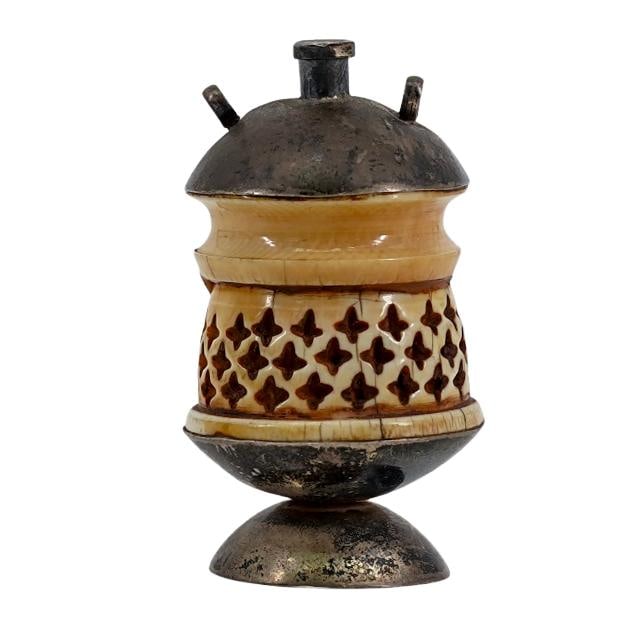 Antique Middle Eastern Silver And Carved Bone Pendant: Antique Middle Eastern Silver And Carved Bone PendantLate 19th-Early 20th Century, Middle EastAntique Middle Eastern silver and carved bone pendant. Total weight: 24 grs.H: 2 1/4"