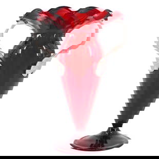 Att. Barovier Seguso & Ferro Murano Glass Vase: Att. Barovier Seguso & Ferro Murano Glass Vase20th century, ItalyA Murano glass vase in red with milky white glass floral handles and a petal cut rim. Attributed in design to Barovier Seguso & Ferro.H