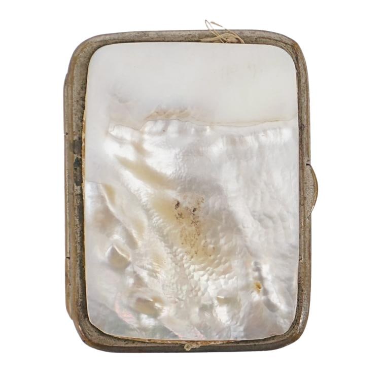 Victorian Mother of Pearl Coin Wallet: Victorian Mother of Pearl Coin Wallet19th century, EuropeVictorian Era mother-of-pearl coin wallet. Floral engraving and a small raised shield emblem. Composite metal hardware and lined with cream col