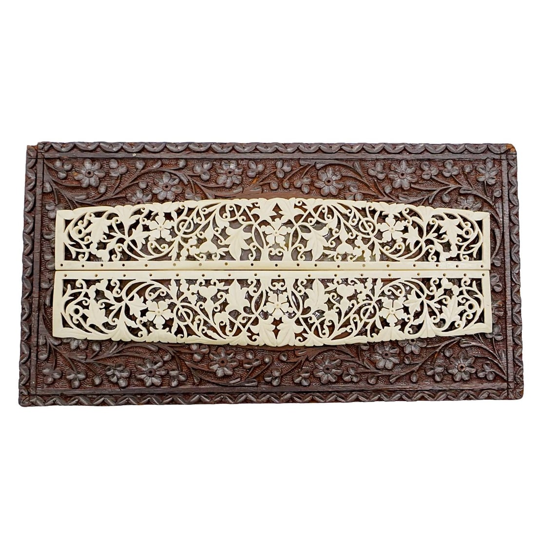 Indian Carved Bone & Wood Floral Plaque: Indian Carved Bone & Wood Floral PlaqueLate 19th-early 20th century, IndiaAn Indian carved bone & wood plaque with intricate floral detail.L 10 1/2" W 5 1/4"