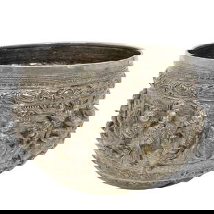 Antique Burmese Silver Repousse Bowl: Antique Burmese Silver Repousse BowlLate 19th-early 20th century, Burma/MyanmarAn antique Burmese silver repousse bowl featuring figural folklore scenes throughout and decorative elements. Total weigh
