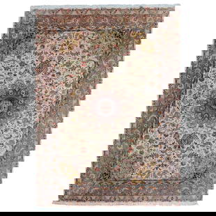 Persian Tabriz Wool & Silk Rug: Persian Tabriz Wool & Silk RugIran, 20th centuryA Persian Tabriz wool and silk area rug. Features a light mauve and cream colored body with various floral ornamentation throughout. White tassels. Cent