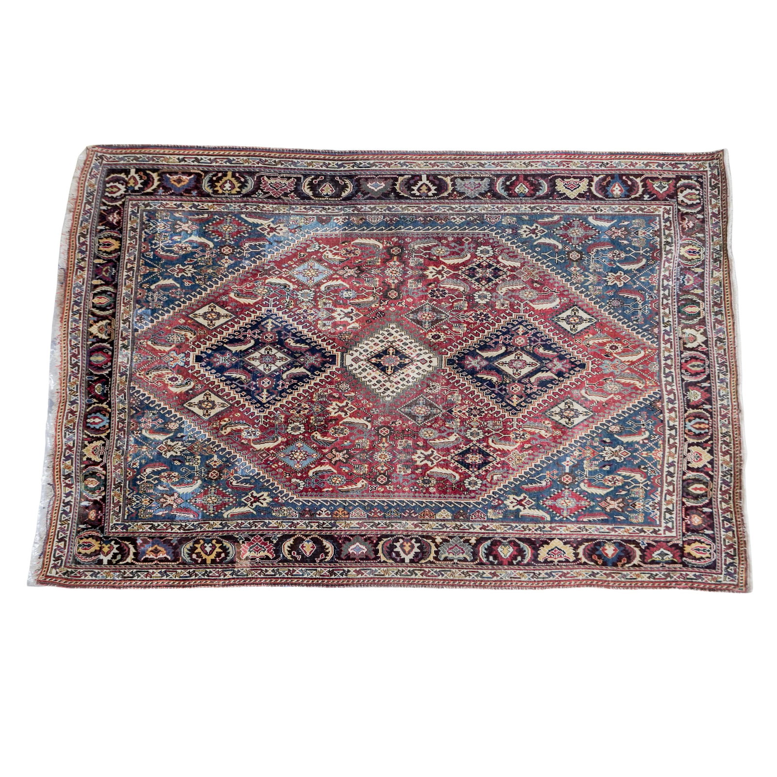 Traditional Central Asian Bukhara Rug: Traditional Central Asian Bukhara Rug 20th century, Central Asia Bukhara rug featuring repeating octagonal "gul" motifs on a deep red field, with fringe on both ends. H: 76" W: 50"
