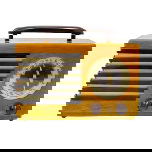 Art Deco Emerson Model 400 Aristocrat Radio: Art Deco Emerson Model 400 Aristocrat Radio1940s, USAThis radio was designed in 1940 by industrial designer Norman Bel Geddes (American, 1893-1958) and produced by the Emerson Radio & Phonograph Corpo
