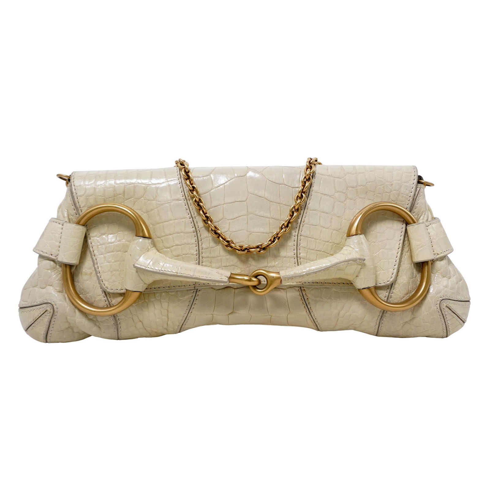 Gucci Bone Crocodile Large Horsebit Clutch Bag: Gucci Bone Crocodile Large Horsebit Clutch Bag21st cent, ItalyOne of Tom Ford's most enduring designs. This jaw-dropping creation is one of Tom Ford's most important for Gucci. Set with the task of re