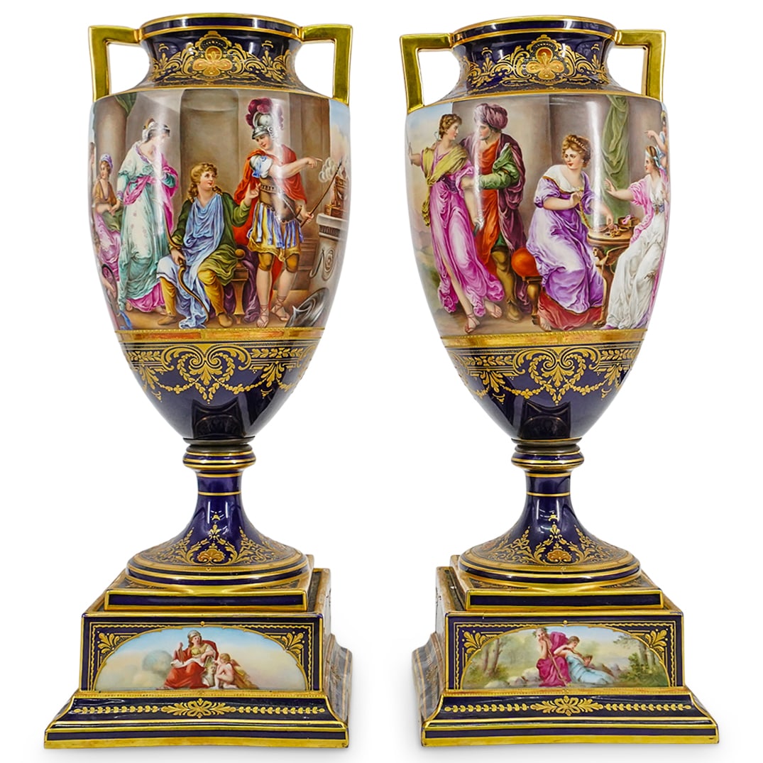 Pair Of Sevres Style Porcelain Urn: Pair Of Sevres Style Porcelain Urn20th century, ItalyPair of cobalt blue porcelain urns with gilt accents and classical mythological scenes. Each urn depicts a square base with additional painted meda