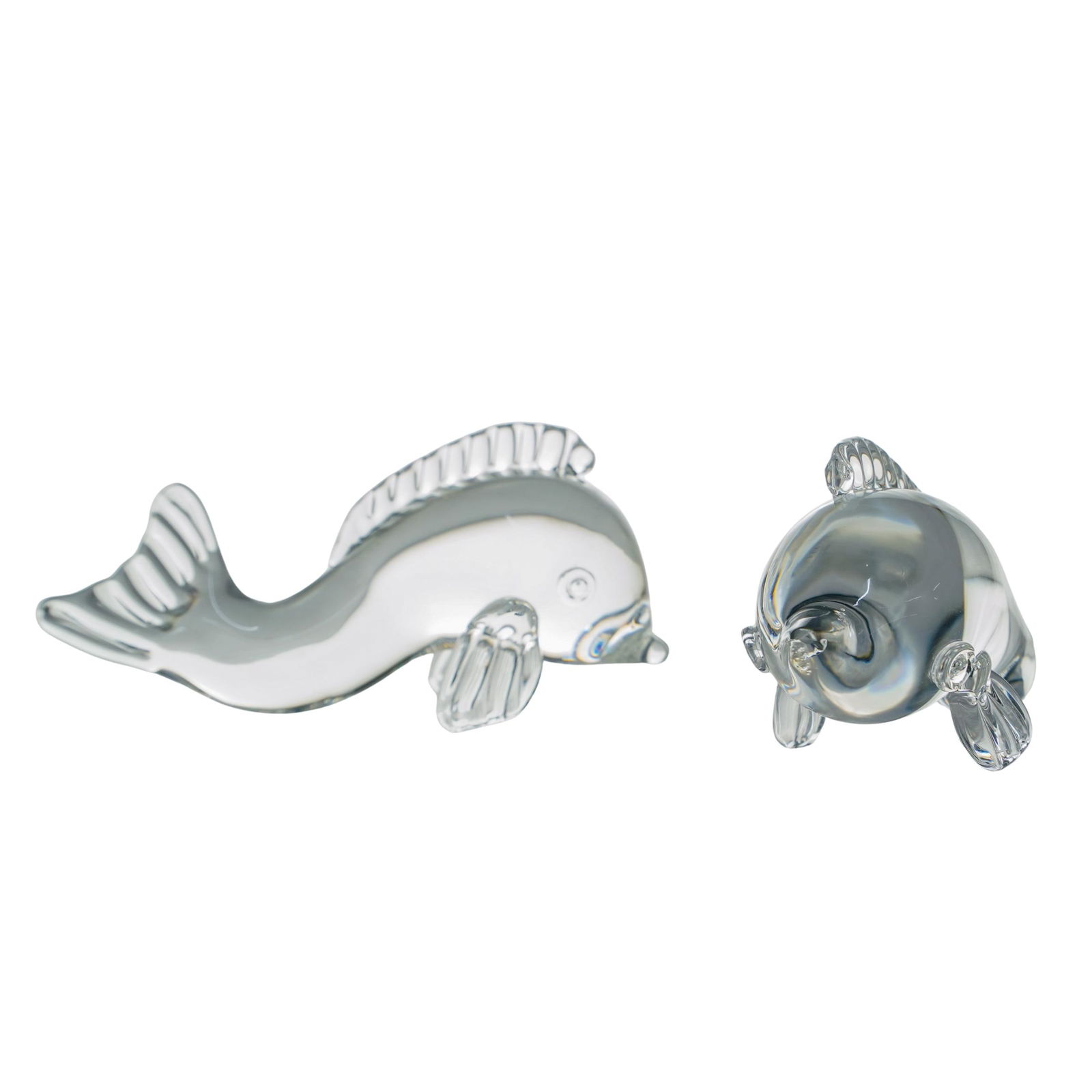 Pair of Vintage Crystal Steuben Dolphin Fish Figurines: Pair of Vintage Crystal Steuben Dolphin Fish Figurines20th c., USATwo clear crystal glass fish designed by George Thompson. One is signed under its front fin.Approx. H: 3" W: 2.5" L: 7"