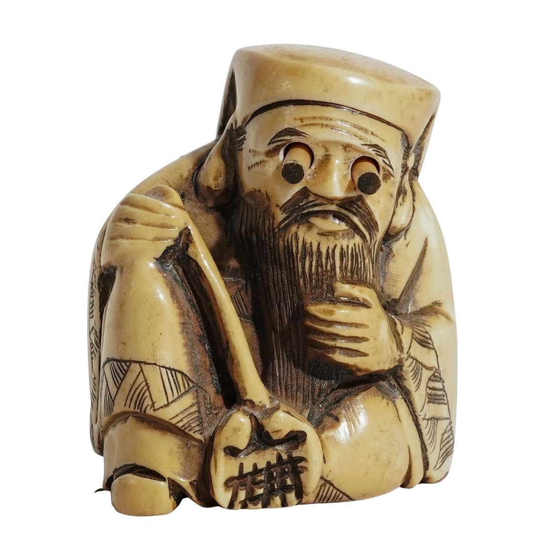 Meiji Japanese Carved Bone Shocked Eyes Netsuke: Meiji Japanese Carved Bone Shocked Eyes Netsuke19th c., JapanAntique Japanese hand carved figurine with eyes that extend to look as though they are popping out in surprise.H: 1.5" W: 1" L: 1.25"