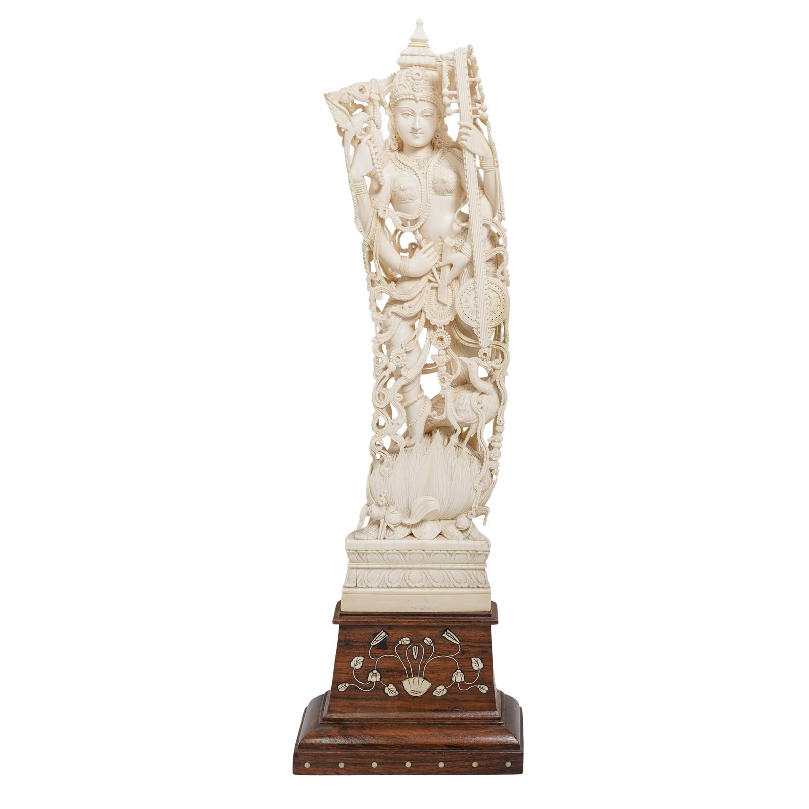 Hindu Saraswati Carved Bone Goddess Statuette: Hindu Saraswati Carved Bone Goddess StatuetteLate 19th-early 20th century, IndiaA carved bone depiction of the Hindu goddess Saraswati, the goddess of music, wisdom, and knowledge. Intricately carved