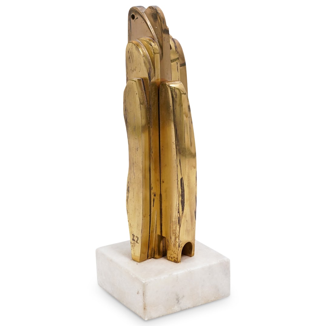 Signed "ZZ" Gilt Metal Sculpture: Signed "ZZ" Gilt Metal Sculpture20th century, ContinentalA gilt metal abstract sculpture signed on side for artist "ZZ". White marble base.H 9" W 2" Base 3" x 3"
