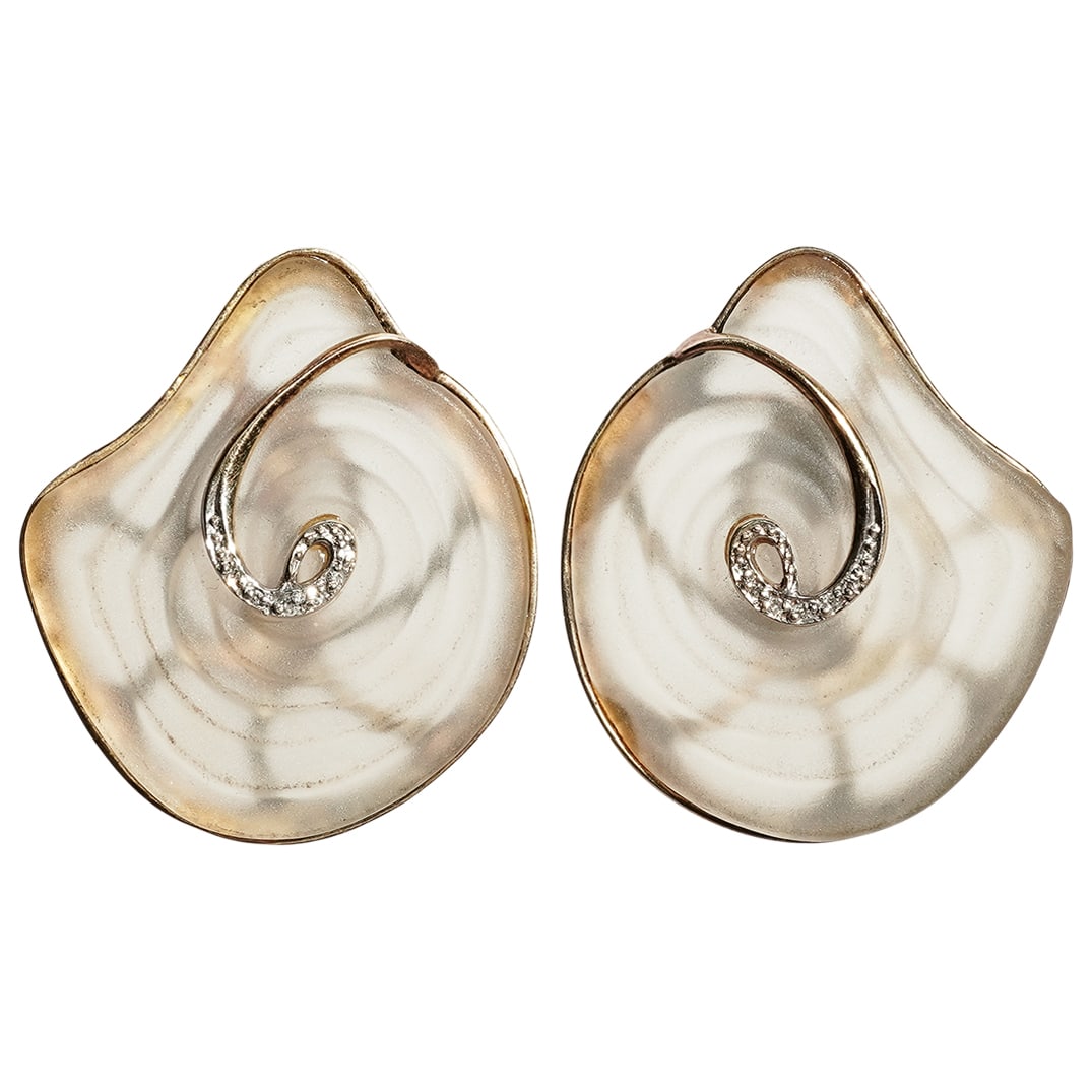 Erte 14K Gold, Sterling, Rock Crystal & Diamond Clip-On Earrings: Erte 14K Gold, Sterling, Rock Crystal & Diamond Clip-On Earrings20th c., FranceRare limited edition vintage clip-on earrings designed by Romain de Tirtoff aka Erte. They are made from carved swirling